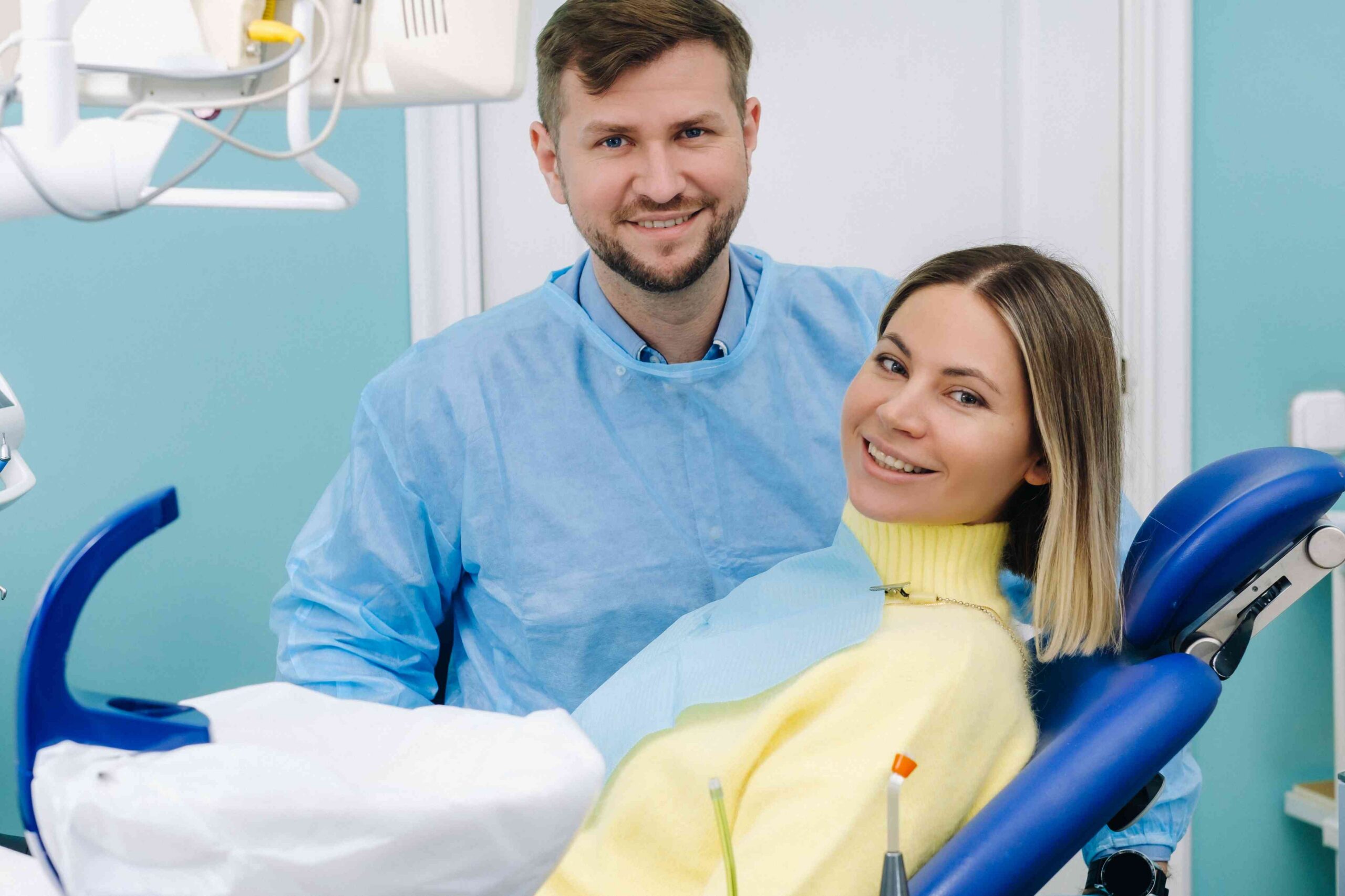 Smiling patient during a routine dental visit.