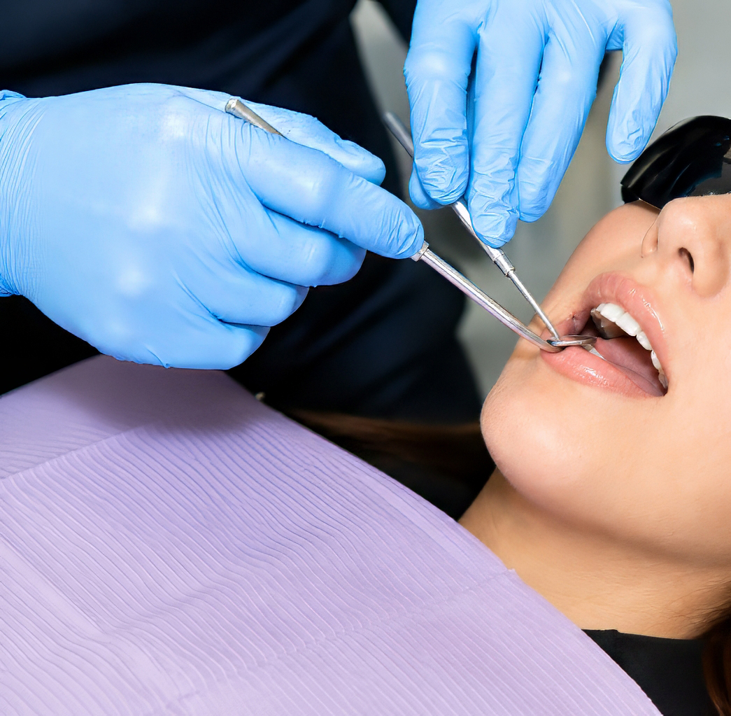 Dental hygienist performing a cleaning at Roseborough Dental, Eglinton and Creditview, Mississauga
